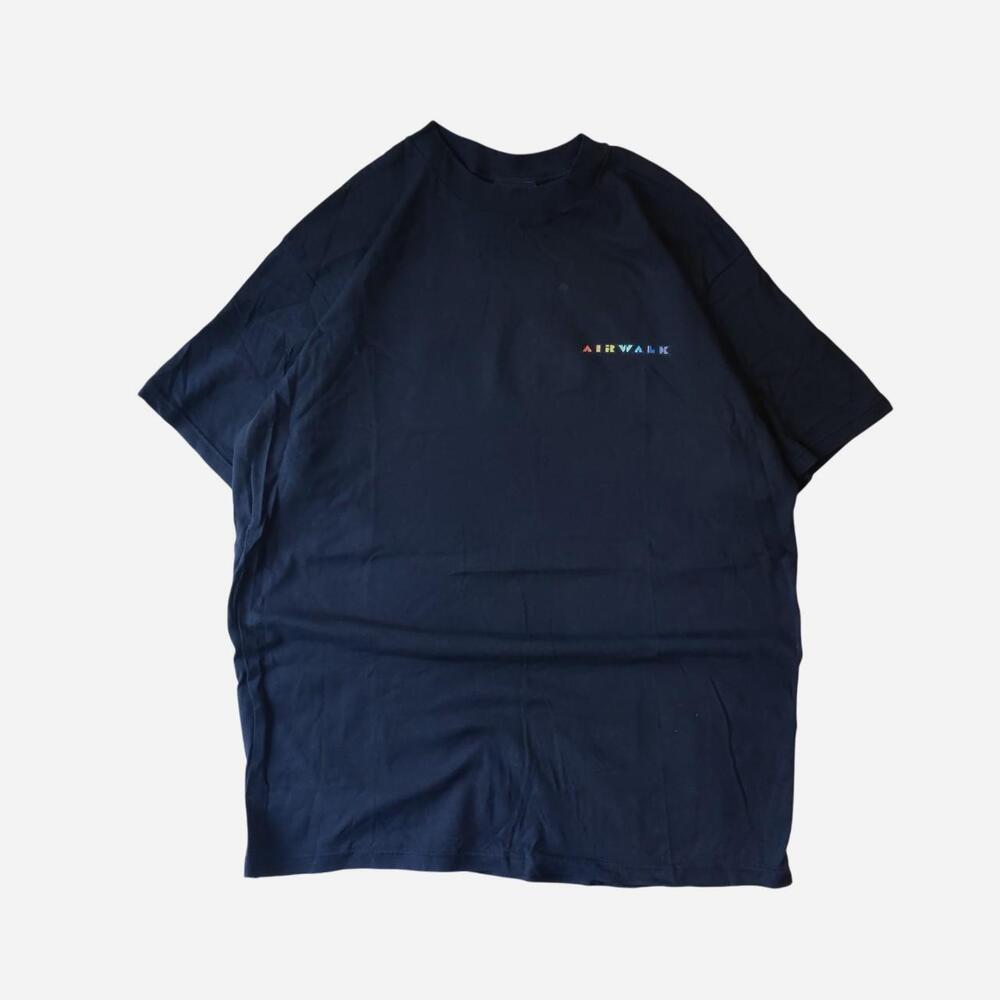 Vintage Airwalk black t-shirt with blue, red, and yellow concentric circles with